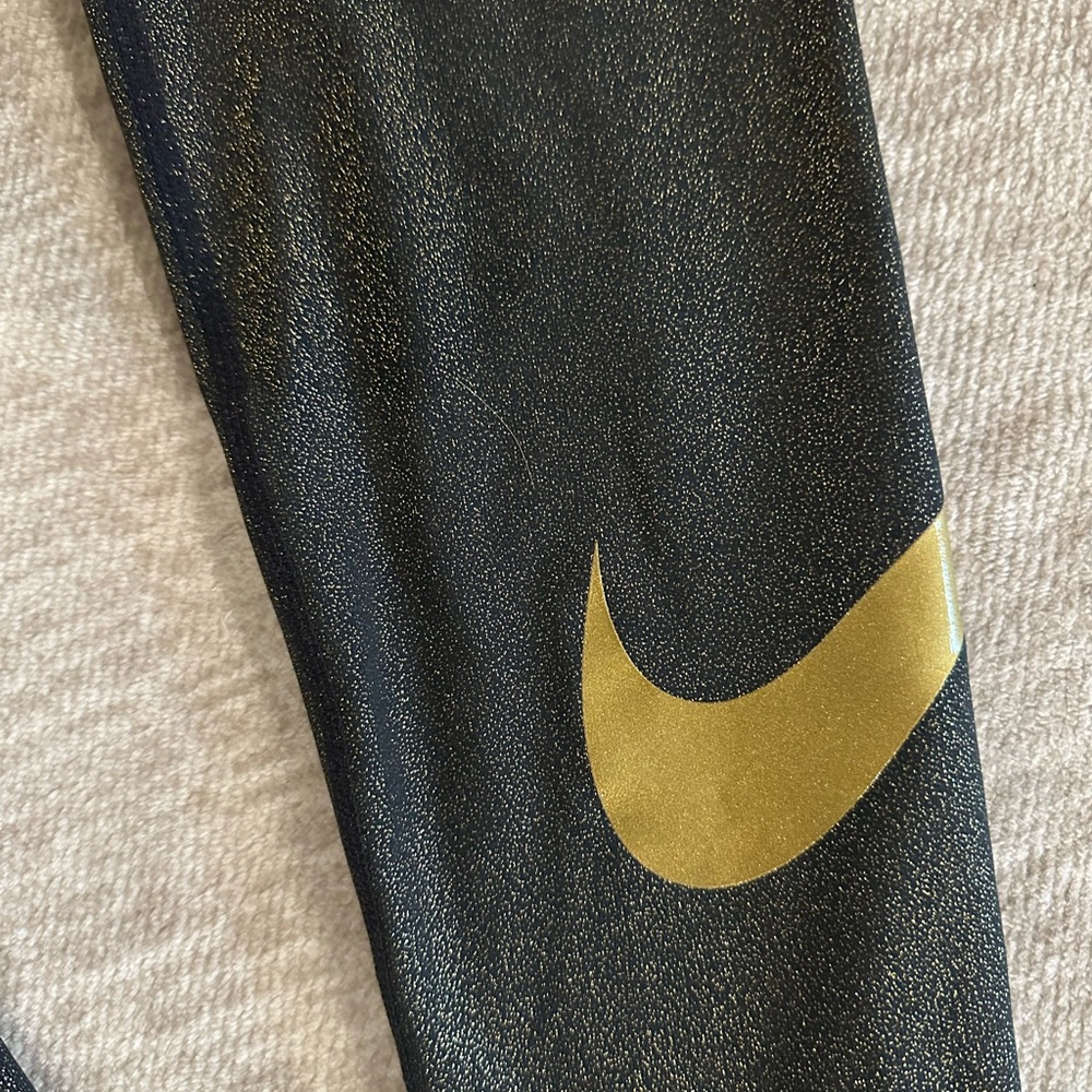 Lot of 2: Nike, glitter leggings w/leg logo. One silver, one gold. Both sz med - Picture 2 of 9